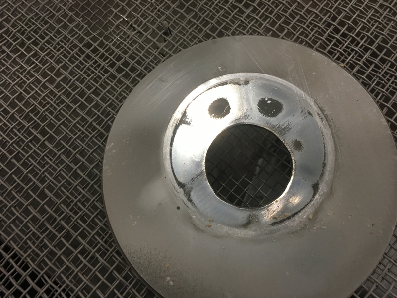 A shaker screen, face formed by the wear to a plastic nut.